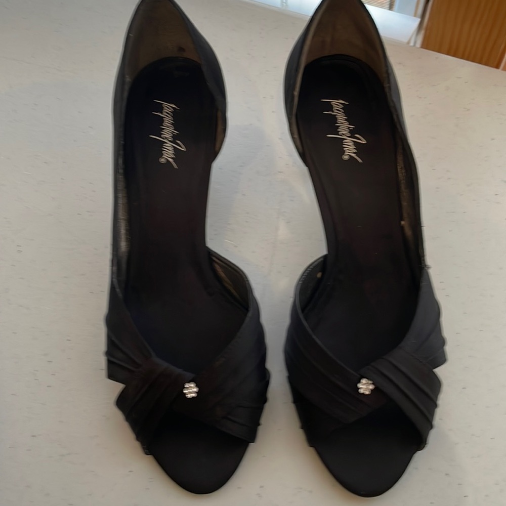 Black satin heels with rhinestone detail